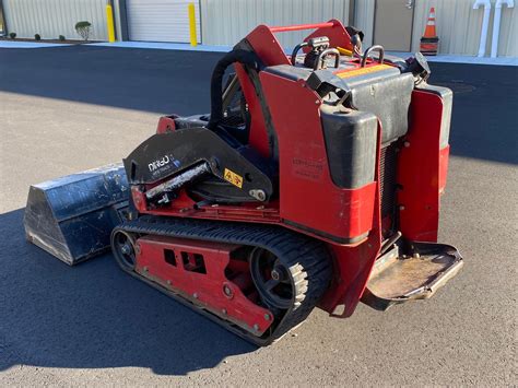 putting track back on mini skid steer|skid steer track back on track.